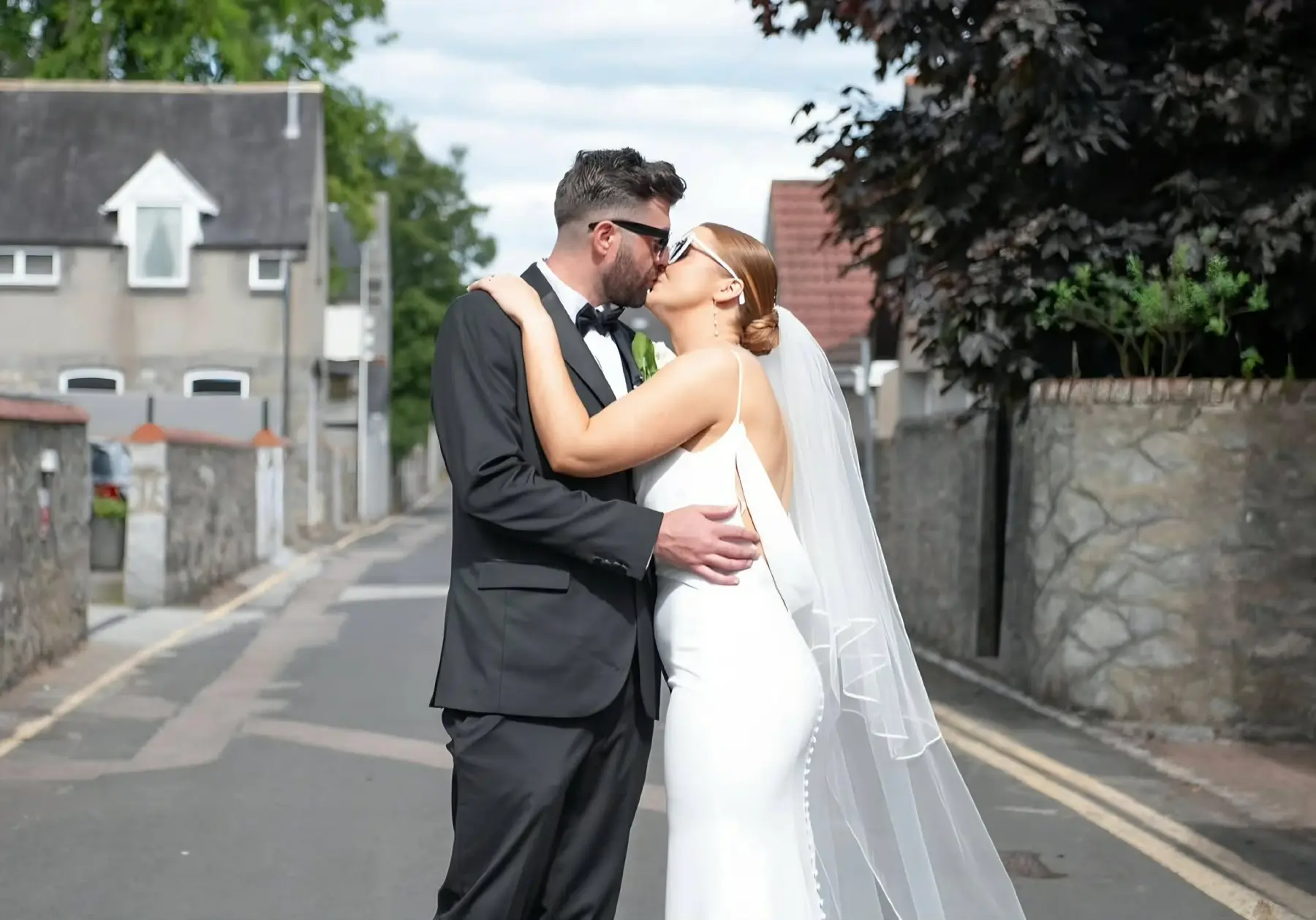Joyful newly married couple together outdoors