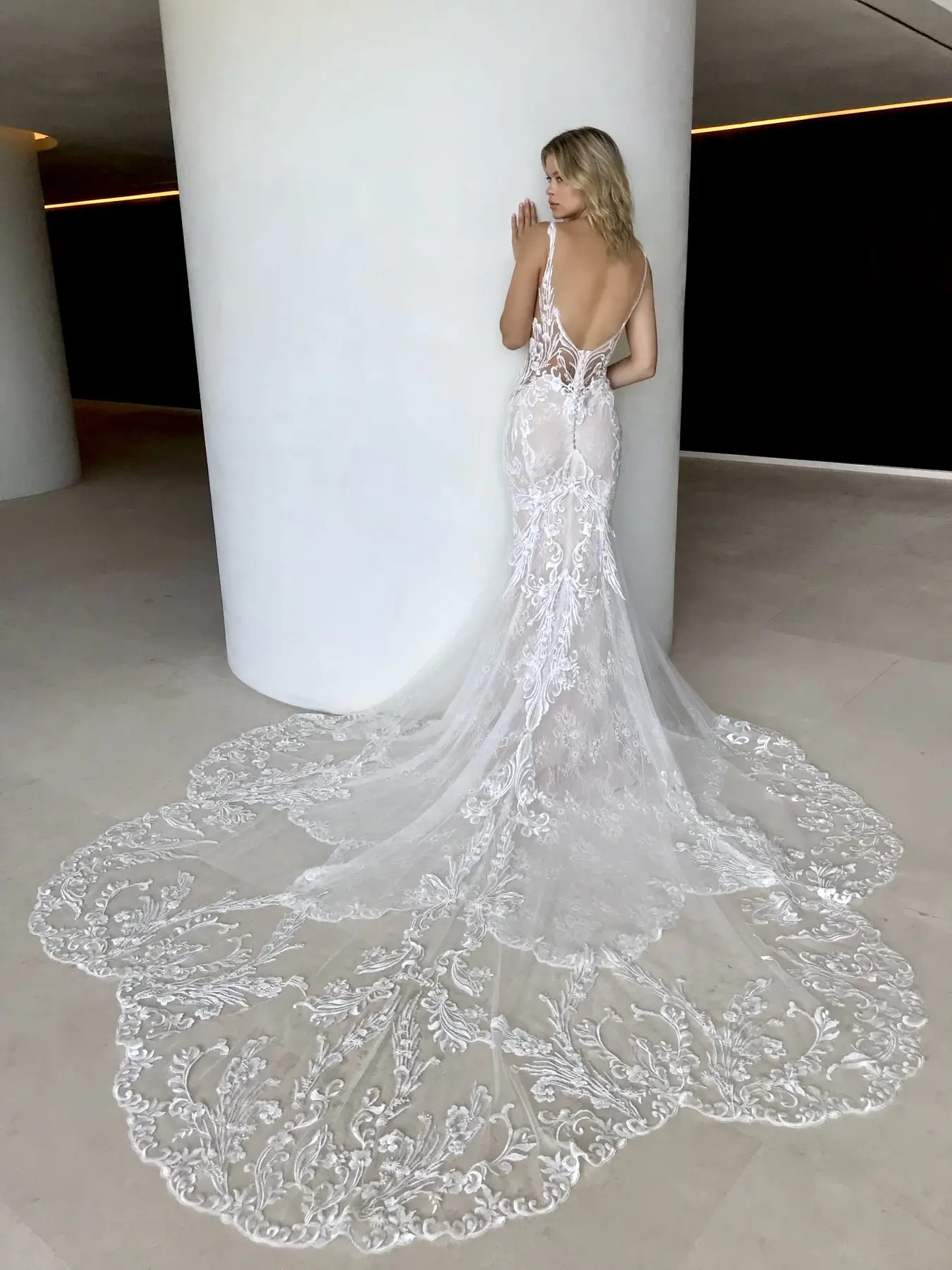 Intricate lace train of a wedding gown