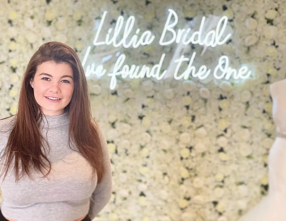 Limara Roberts, owner of Lillia Bridal, inside the boutique